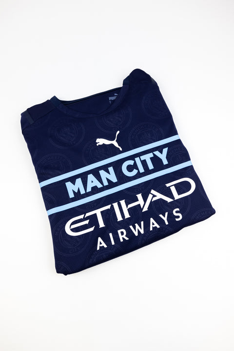 Manchester City 2021-22 football shirt made by Puma size Small.